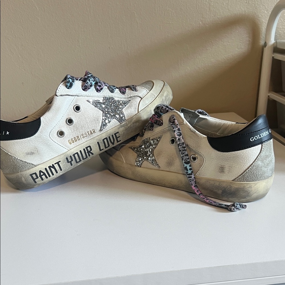 Golden Goose Women’s White and Black Star Sneakers